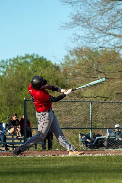 Batter following through on a swing