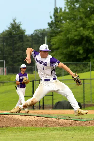 Pitcher following through on his delivery