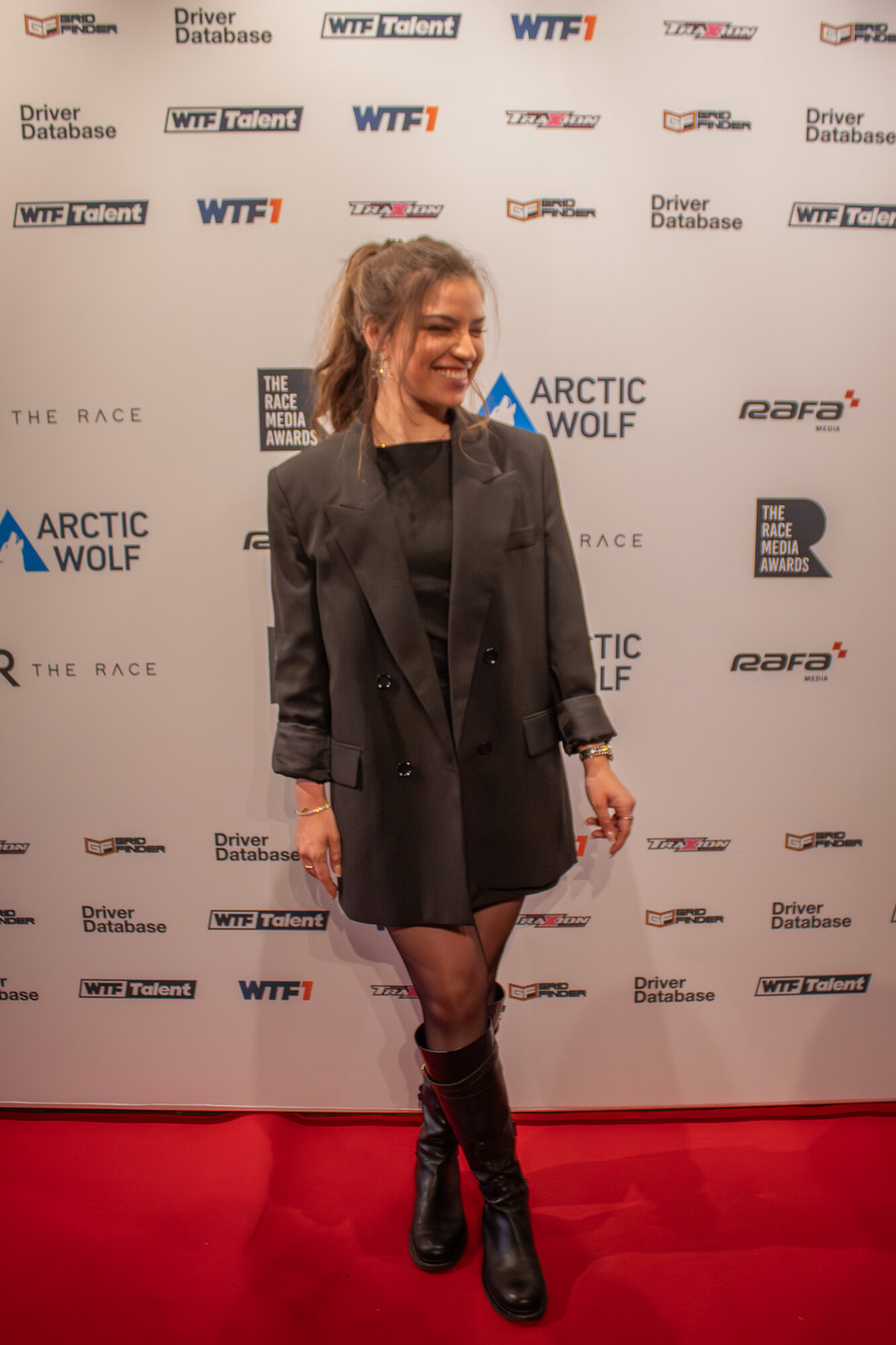 Guest laughing on the red carpet